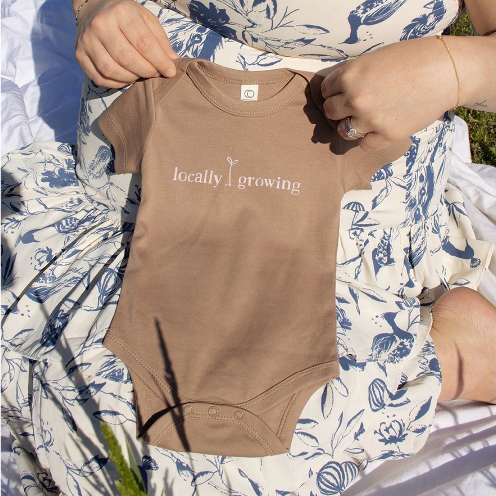 Brown Baby Onesie with 'Locally Growing' Print